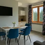 Pokoje Gościnne Pod Lasem